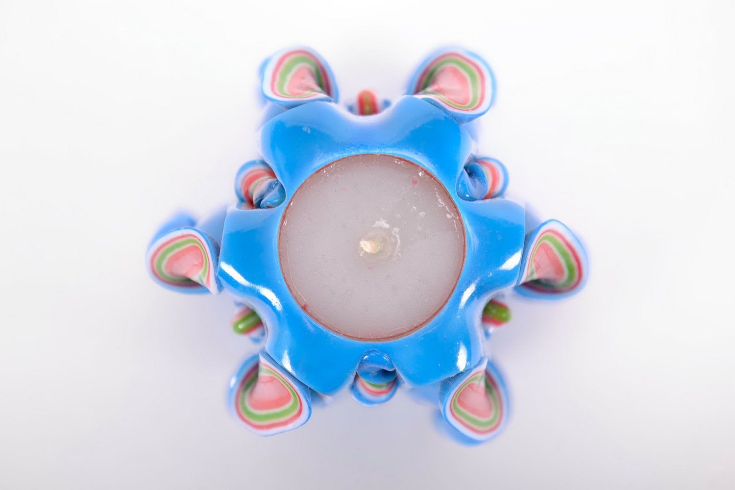 A blue paraffin candle.