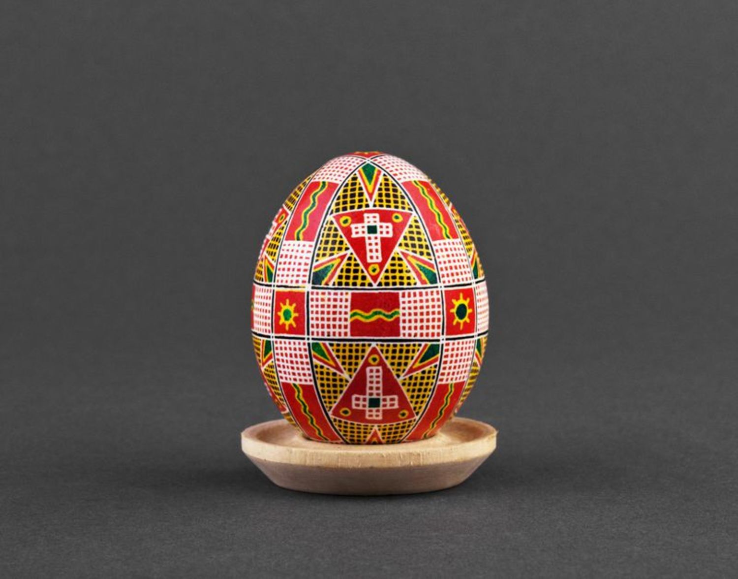 A painted egg with ornamentation.