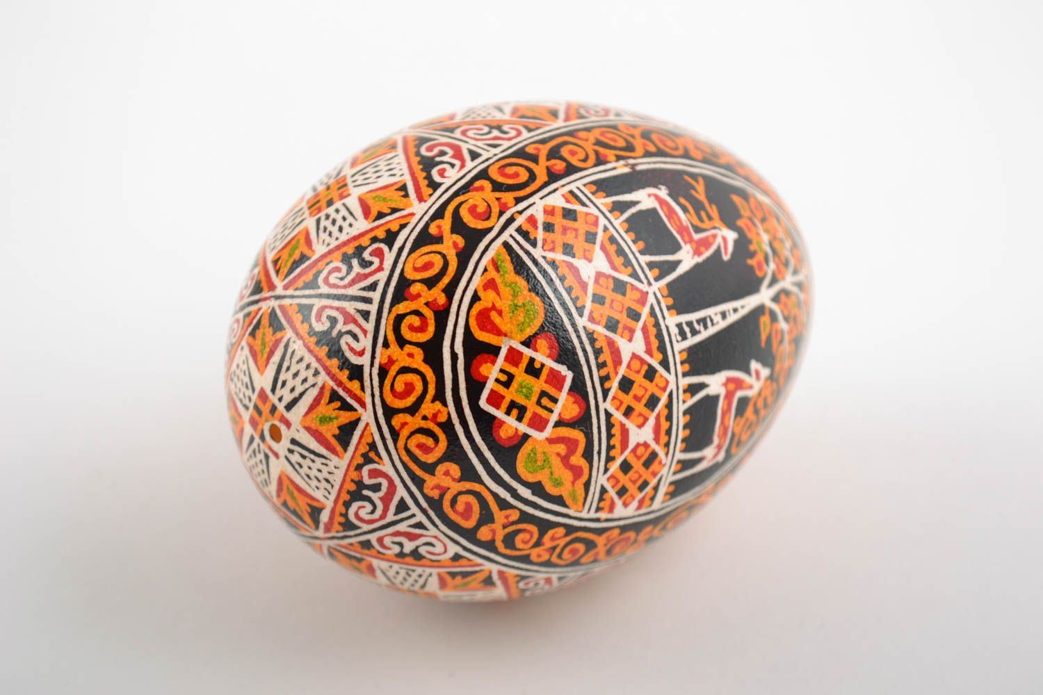 Pysanka with an image of a church.