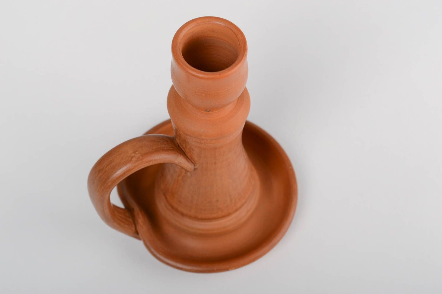 Clay candleholder with manual 