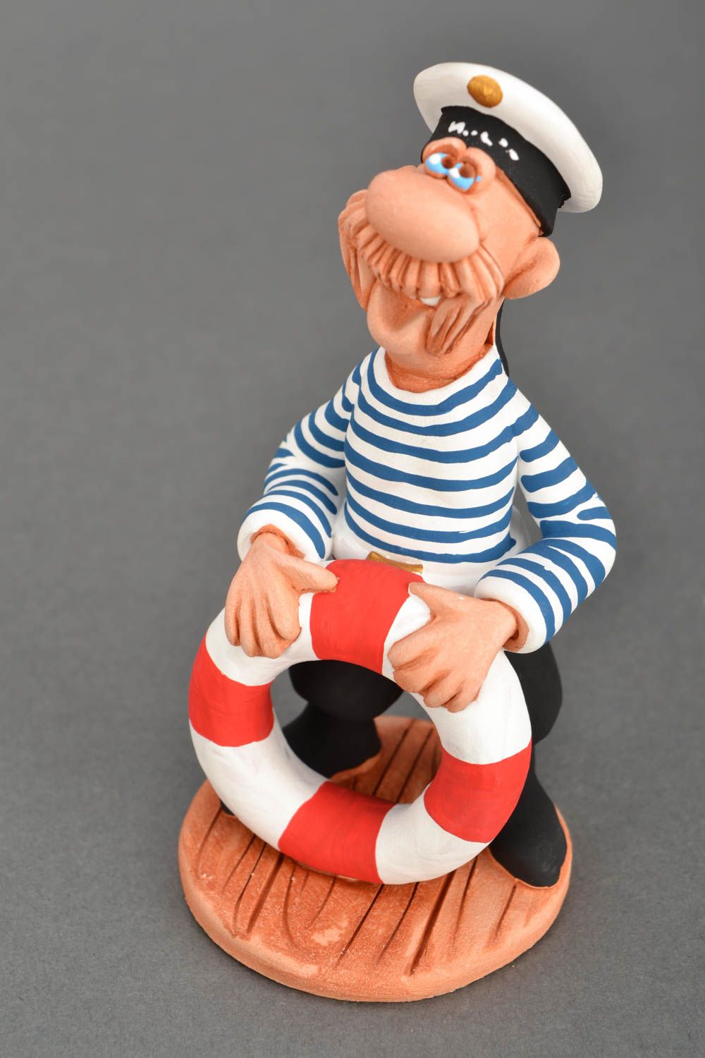 Statue of clay sailor.
