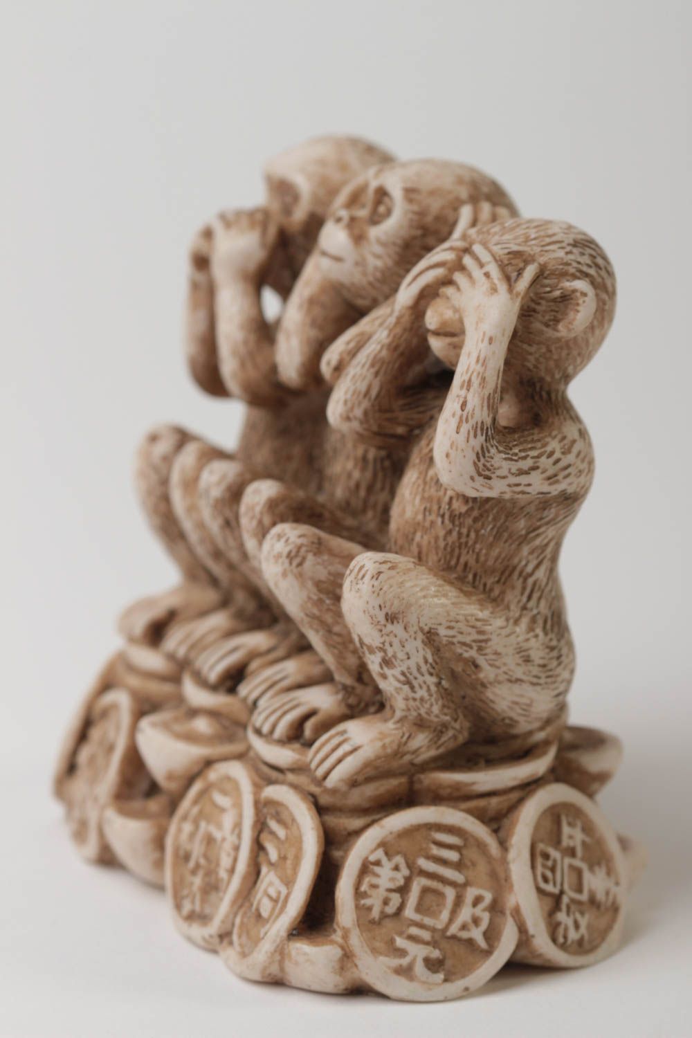 Statuette of three handmade monkeys.