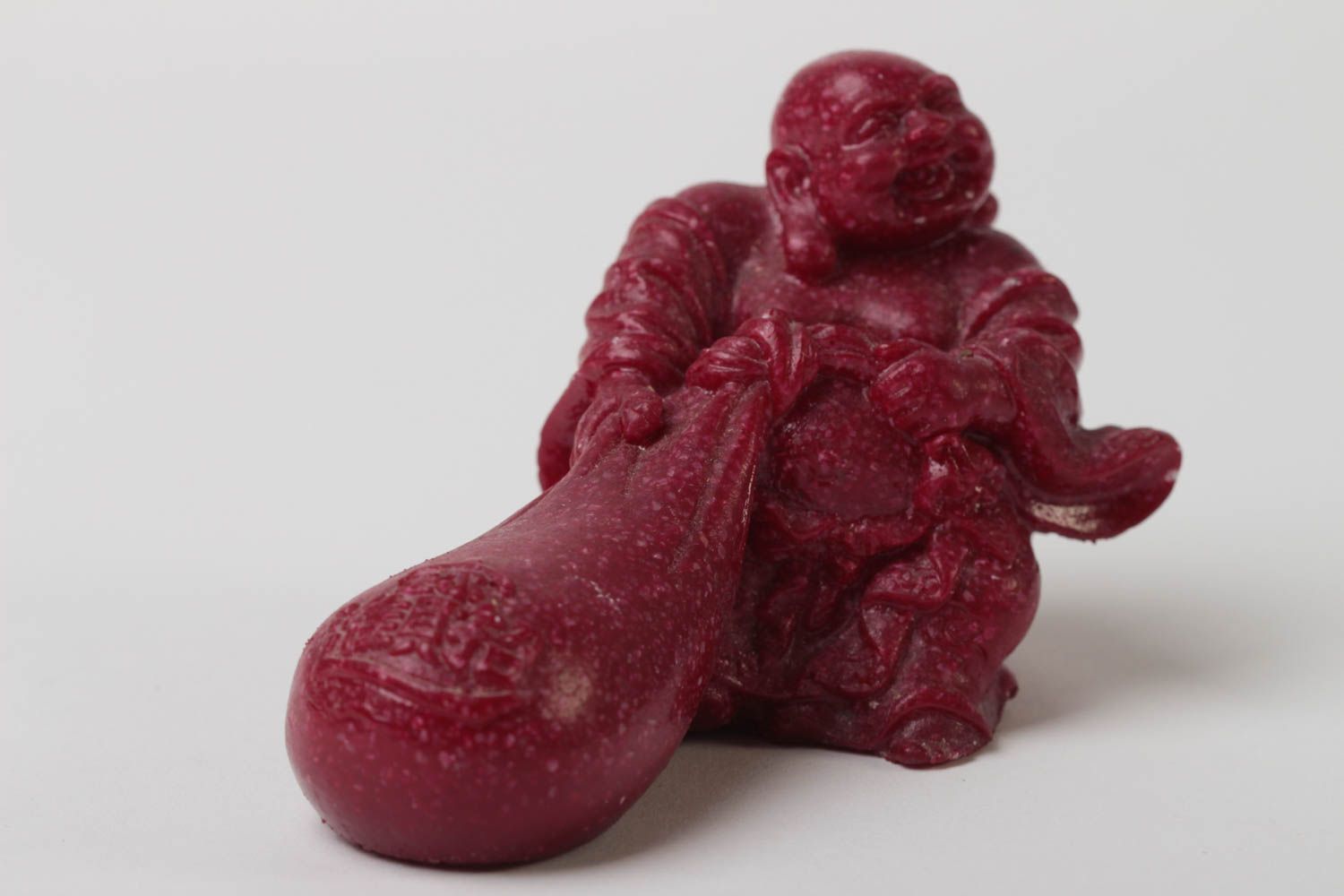 Statuette of polymer resin figure - Want with a bag.