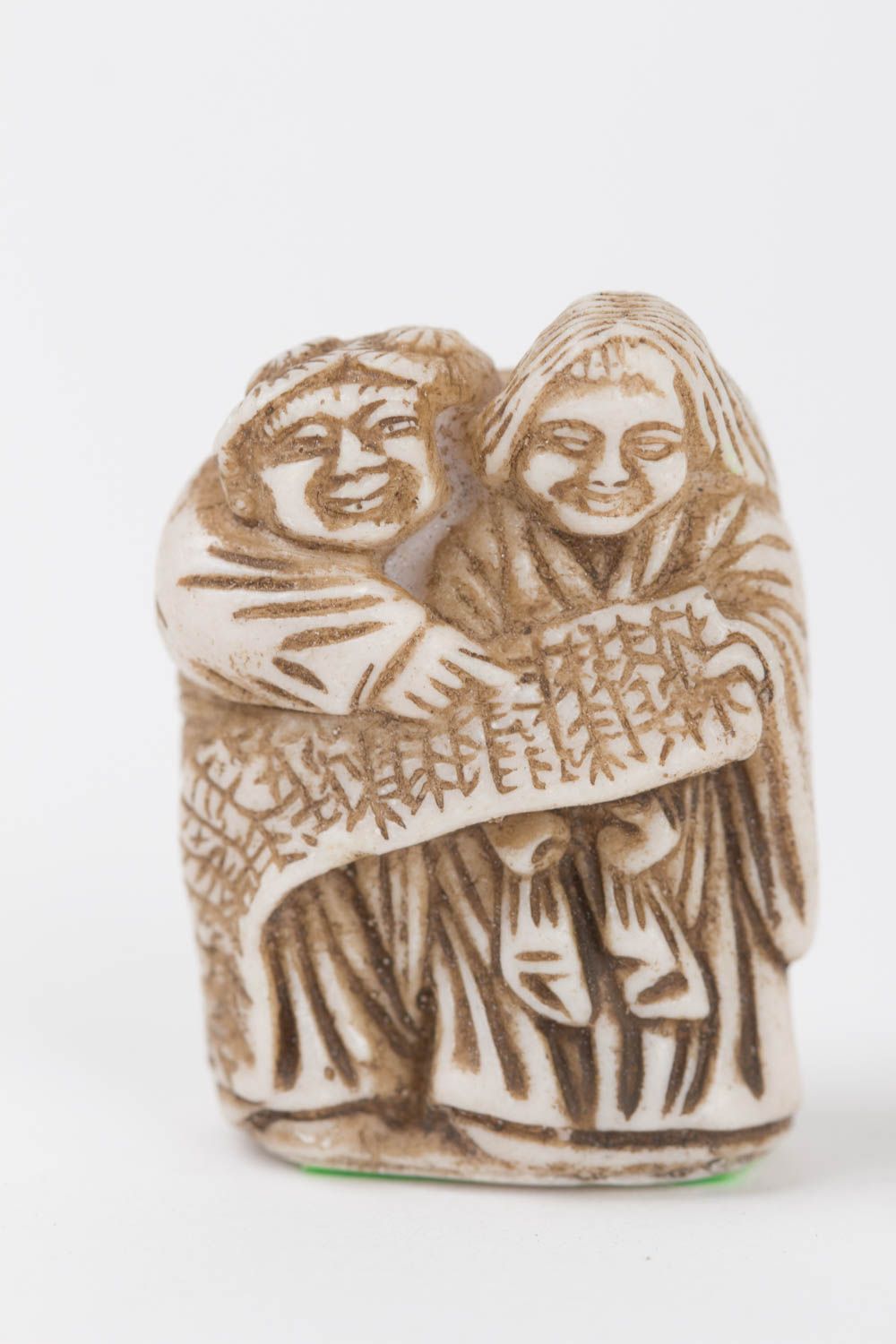 The small figure of Kanzan and Dzittoku is made of polymer resin.