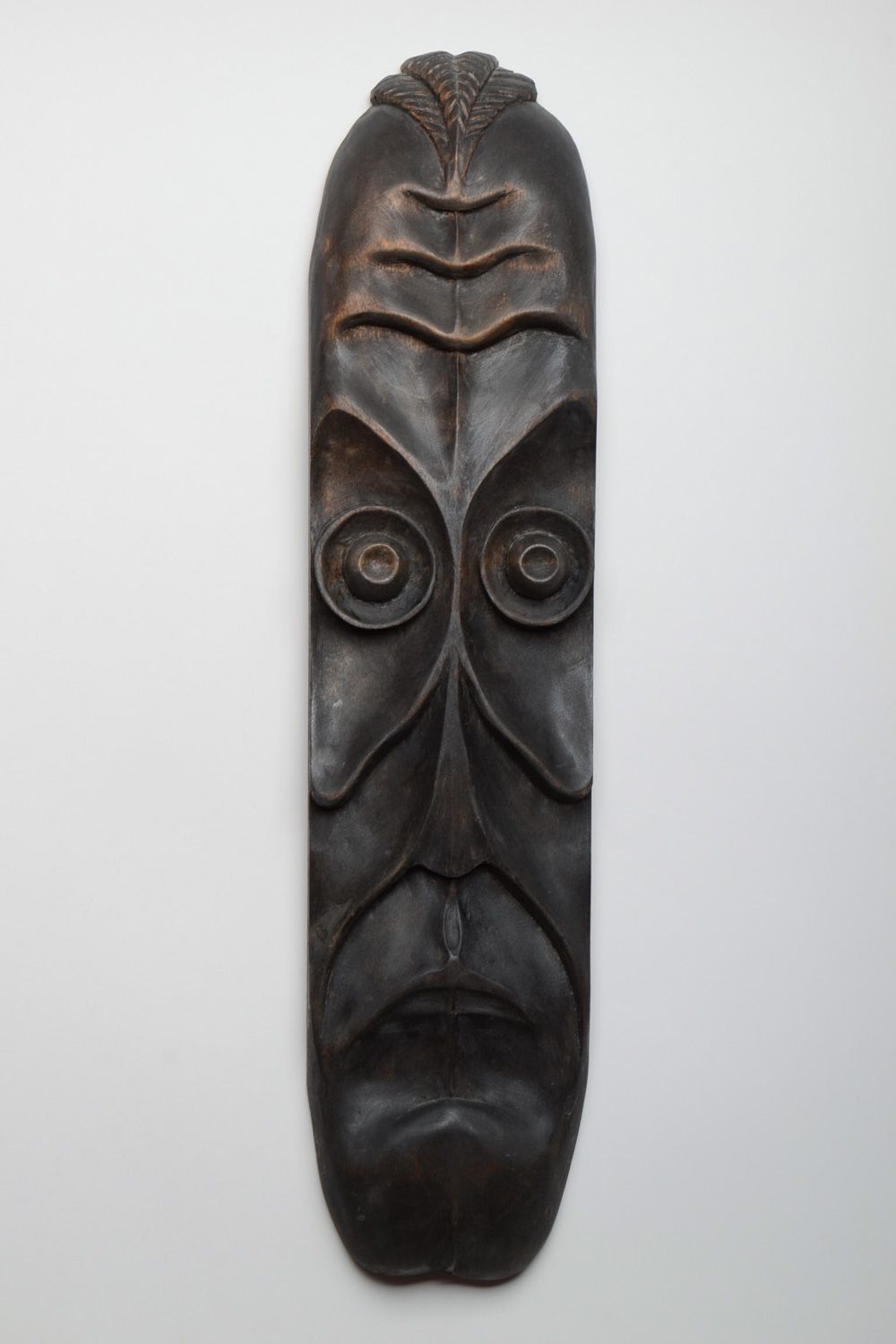 Interior carved wooden mask