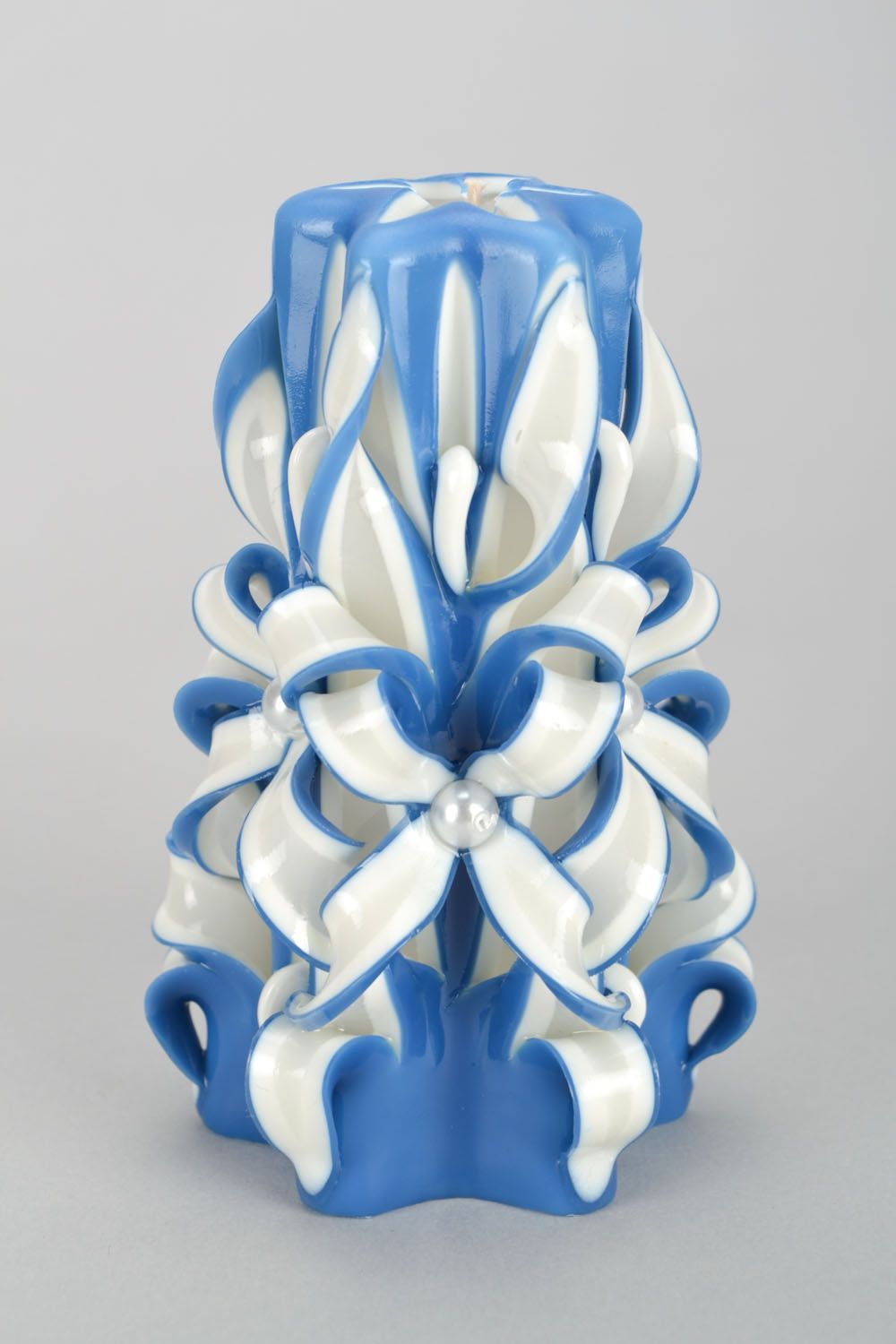 Interesting blue and white carved candle.