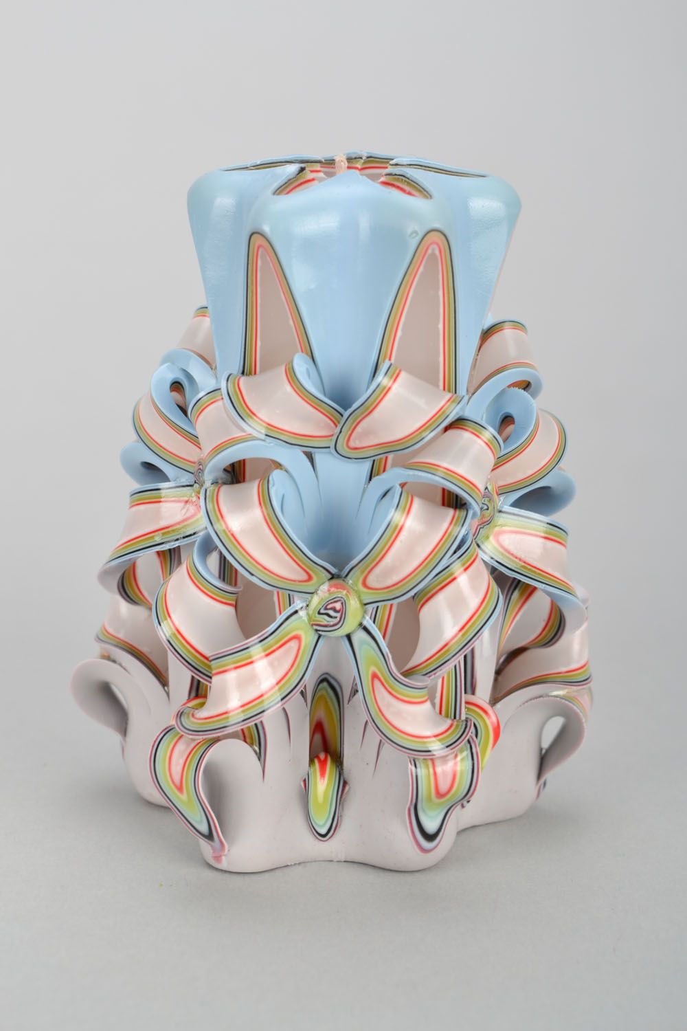 Colorful decorative carved candle.