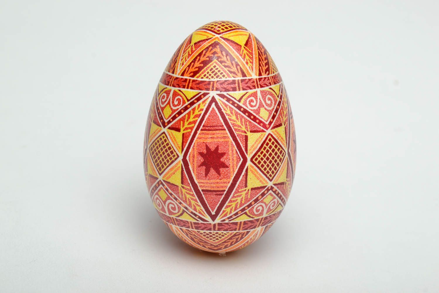 Handmade Easter egg is made of goose egg and painted with a special tool.