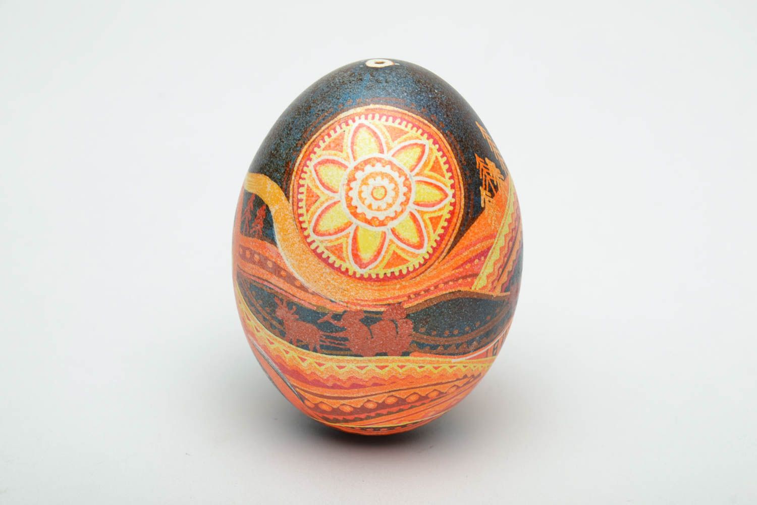 The painted egg with the image of the girl Ukrainian.