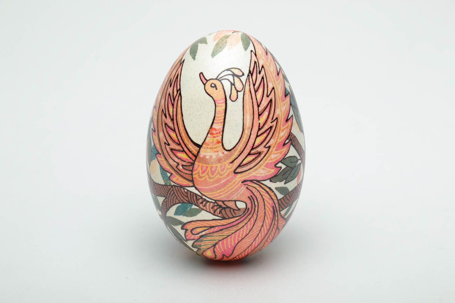 Egg hand-painted with the image of a firebird.