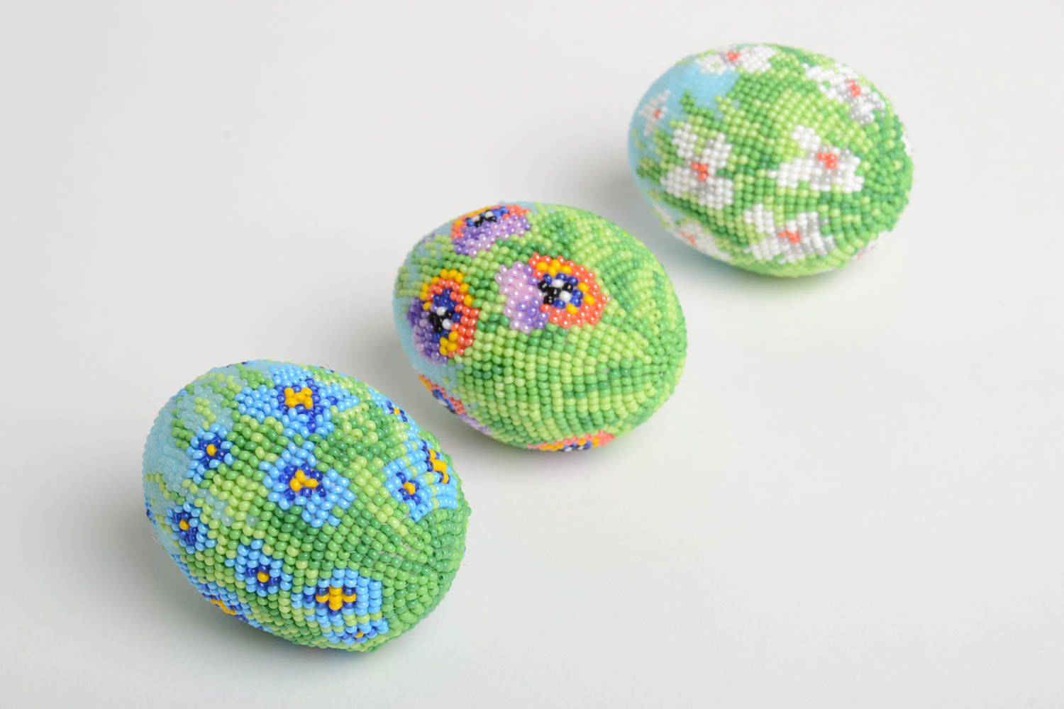 Set of three Easter eggs in spring tones.