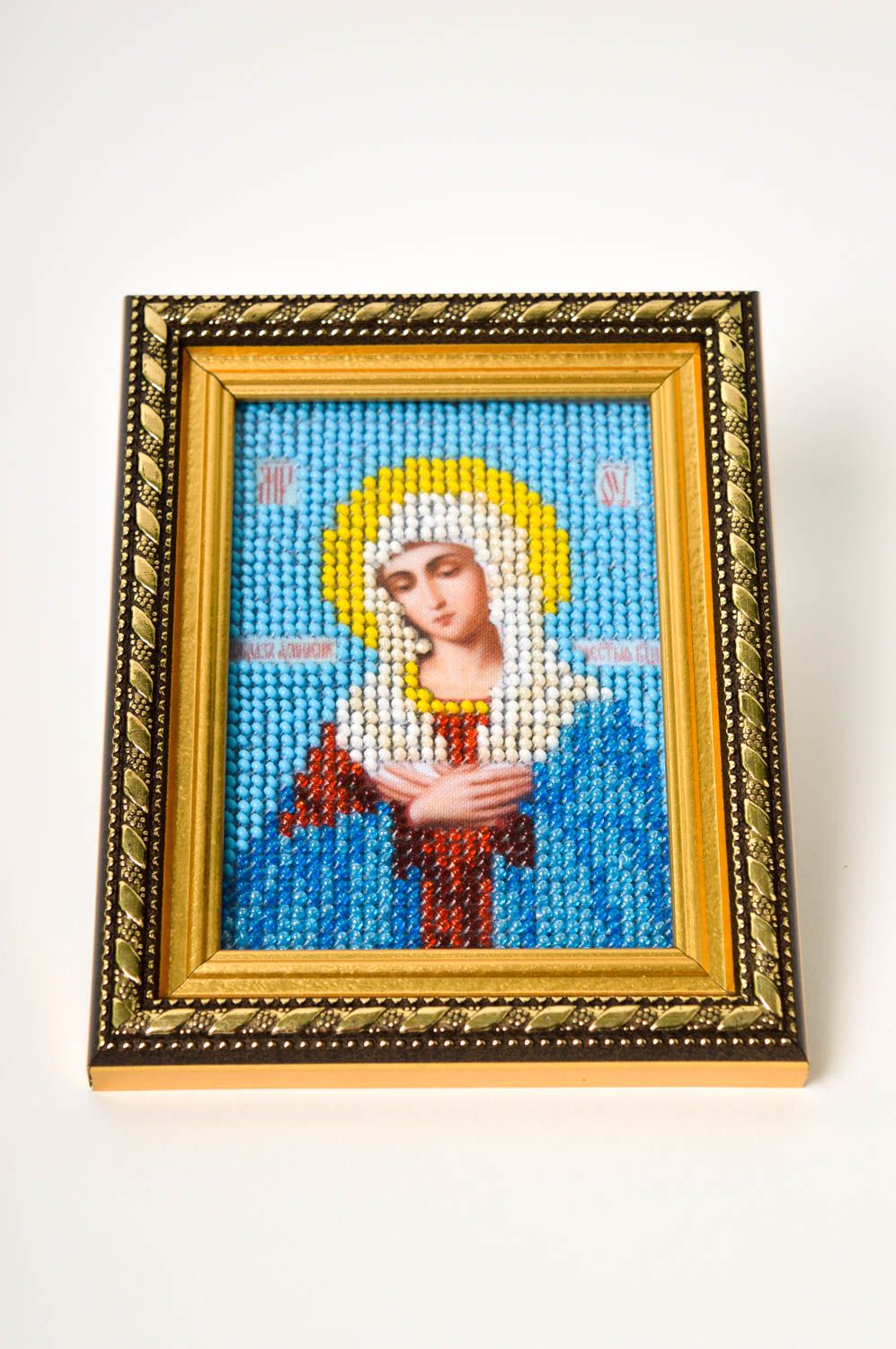 Family icon of the Mother of God embroidered with beads by hand.