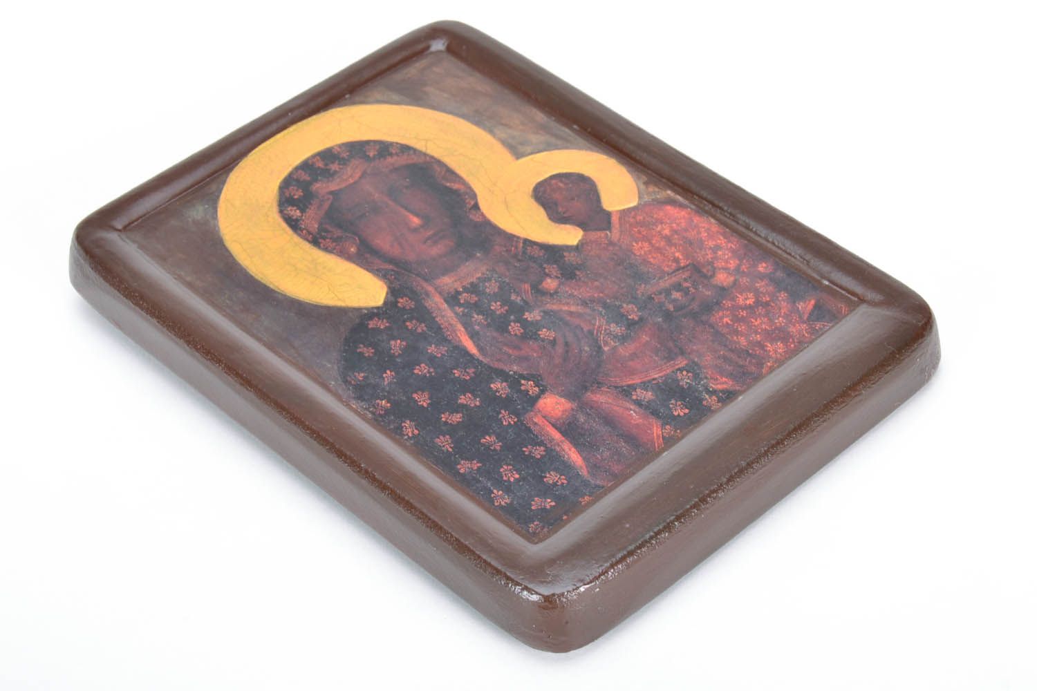 The Czestochowa icon of the Mother of God is made on a wooden base.