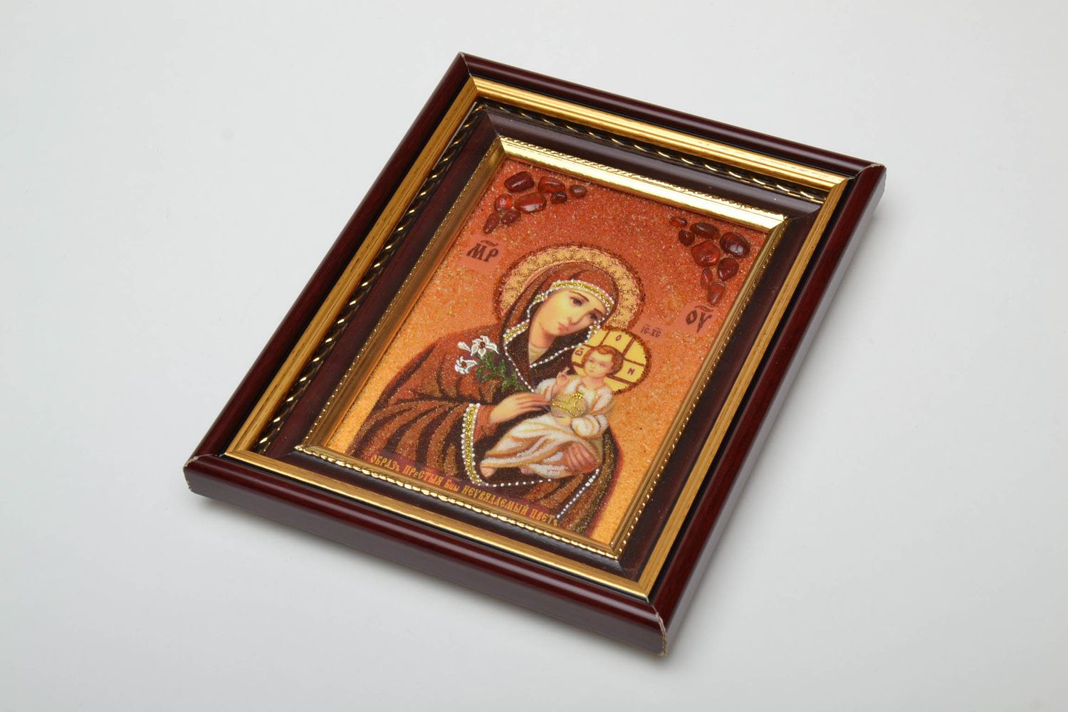 Orthodox icon of the Mother of God with the baby handmade with amber.