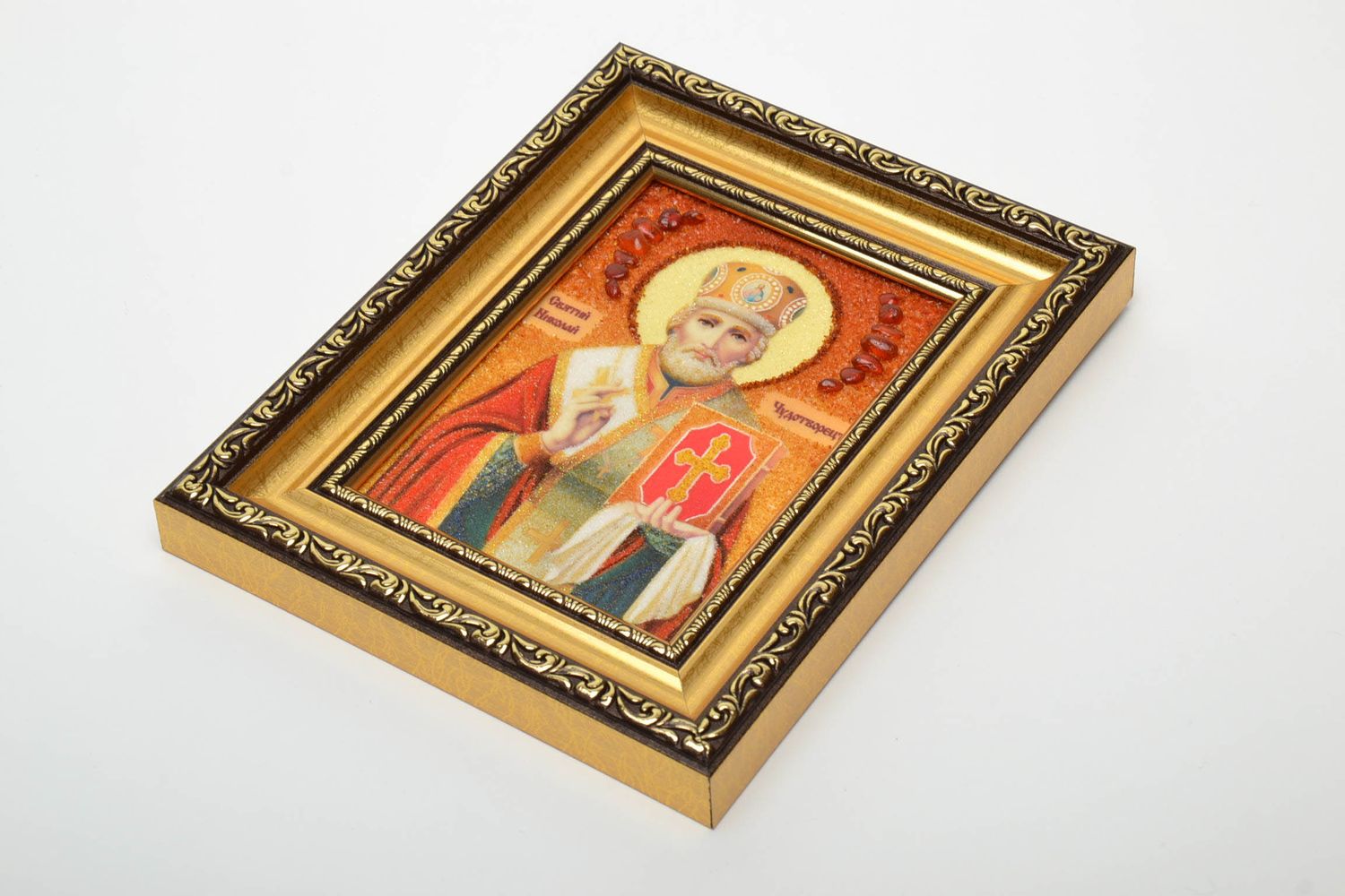 Icon of St. Nicholas the Wonderworker with amber crumb.