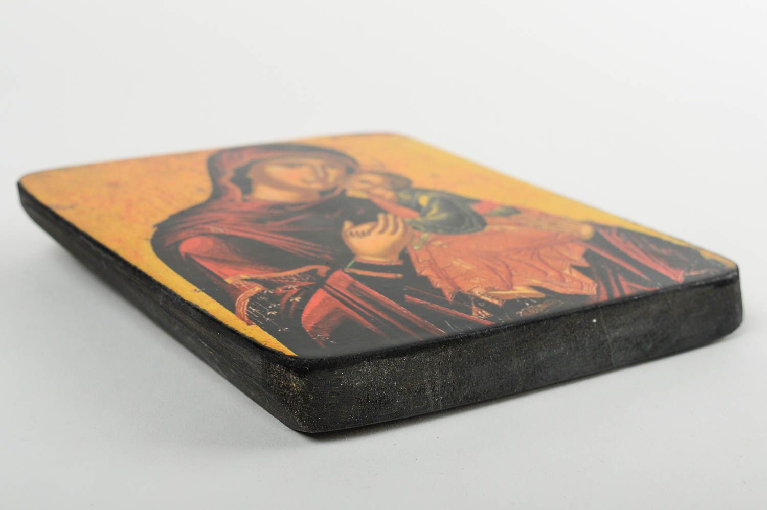 Icon of the Mother of God with the Child, on a wooden base. 