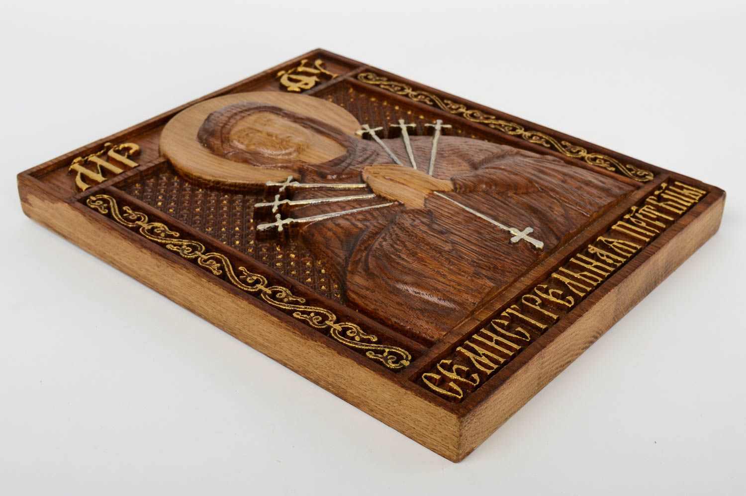 The carved handmade icon of the Mother of God 