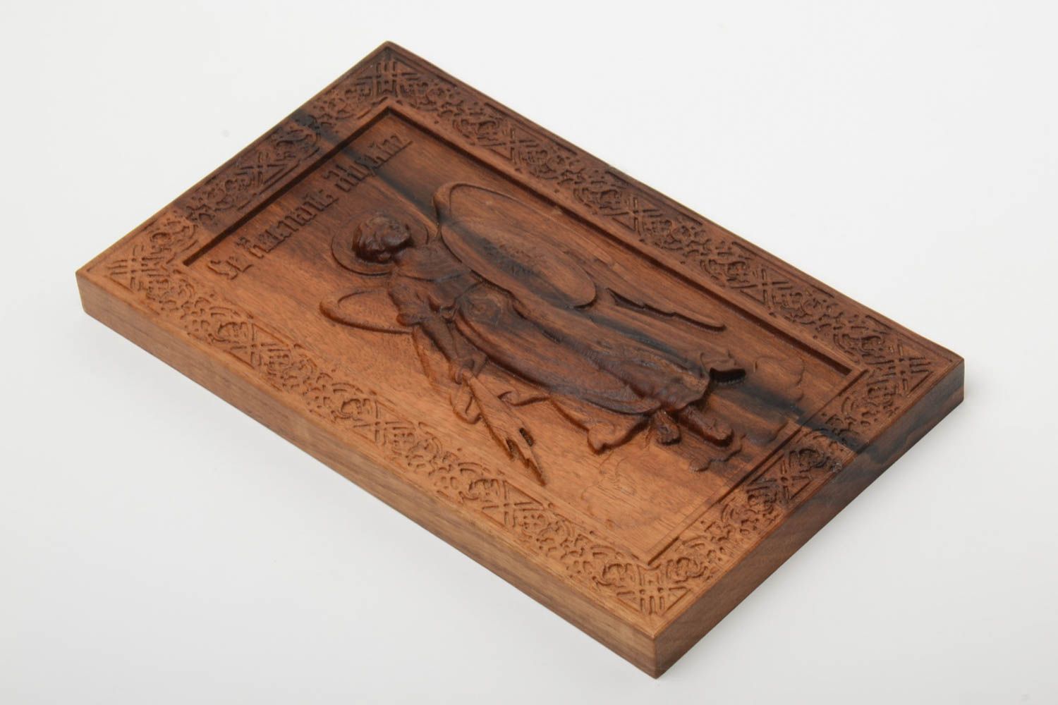 Carved wood icon Archistatig Michael with metal mount.